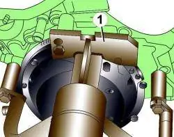 Использование специального инструмента VW 540 (1) при установке двигателя на стенд