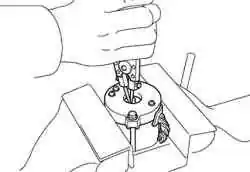 Извлечение пружинного кольца